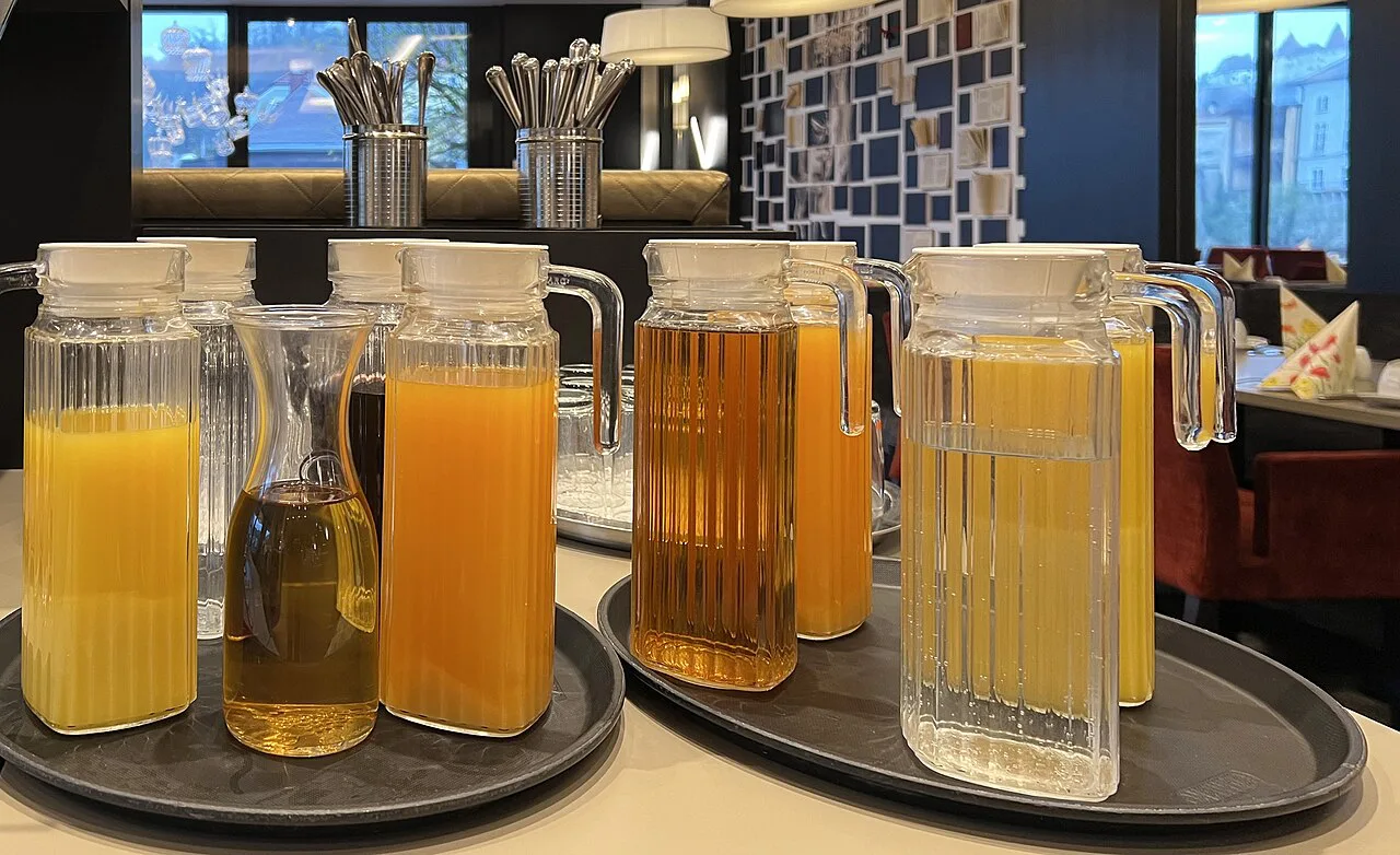 Jugs of juice on a hotel breakfast buffet in Hochburg-Ach, Upper Austria.