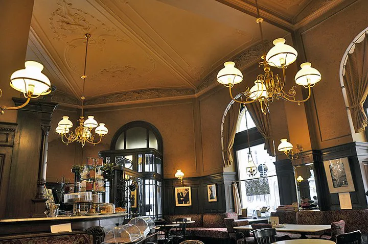 The chandeliered interior of Café Sperl in Vienna.
