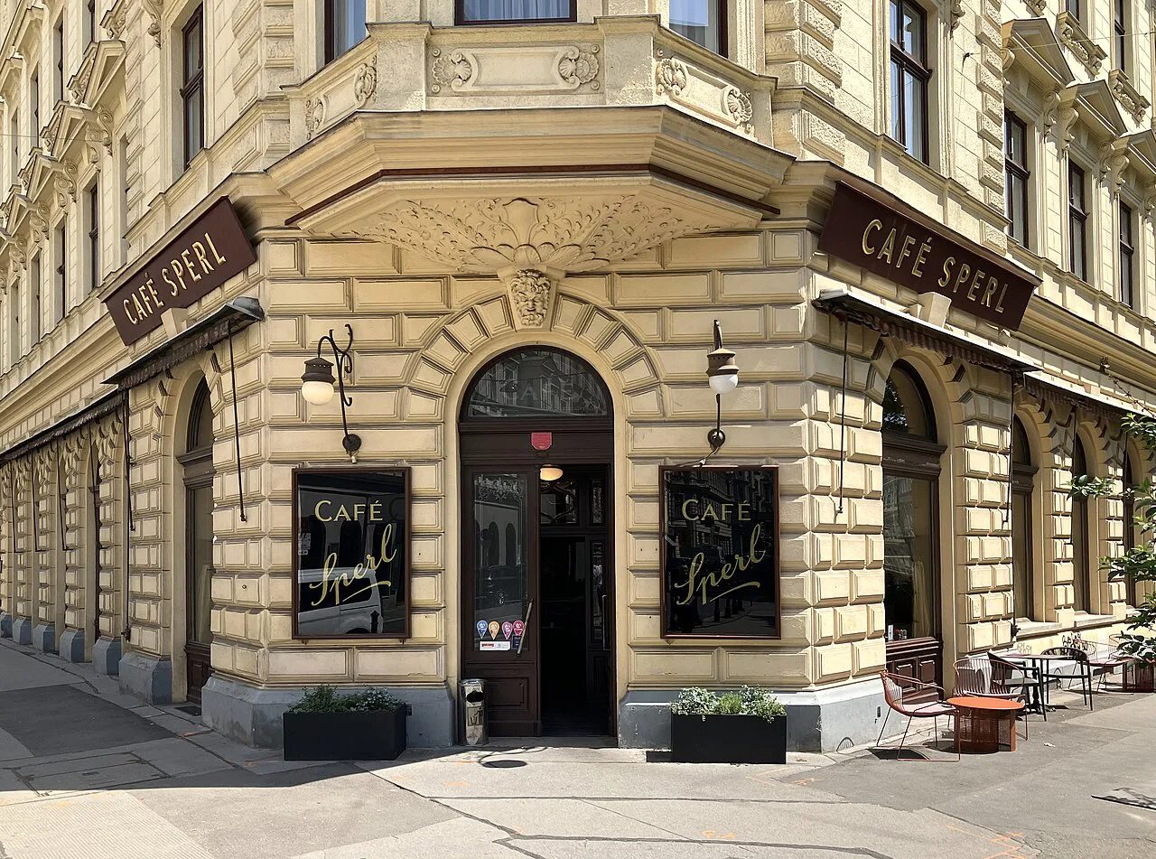 The corner entrance and facade of Café Sperl in Vienna.