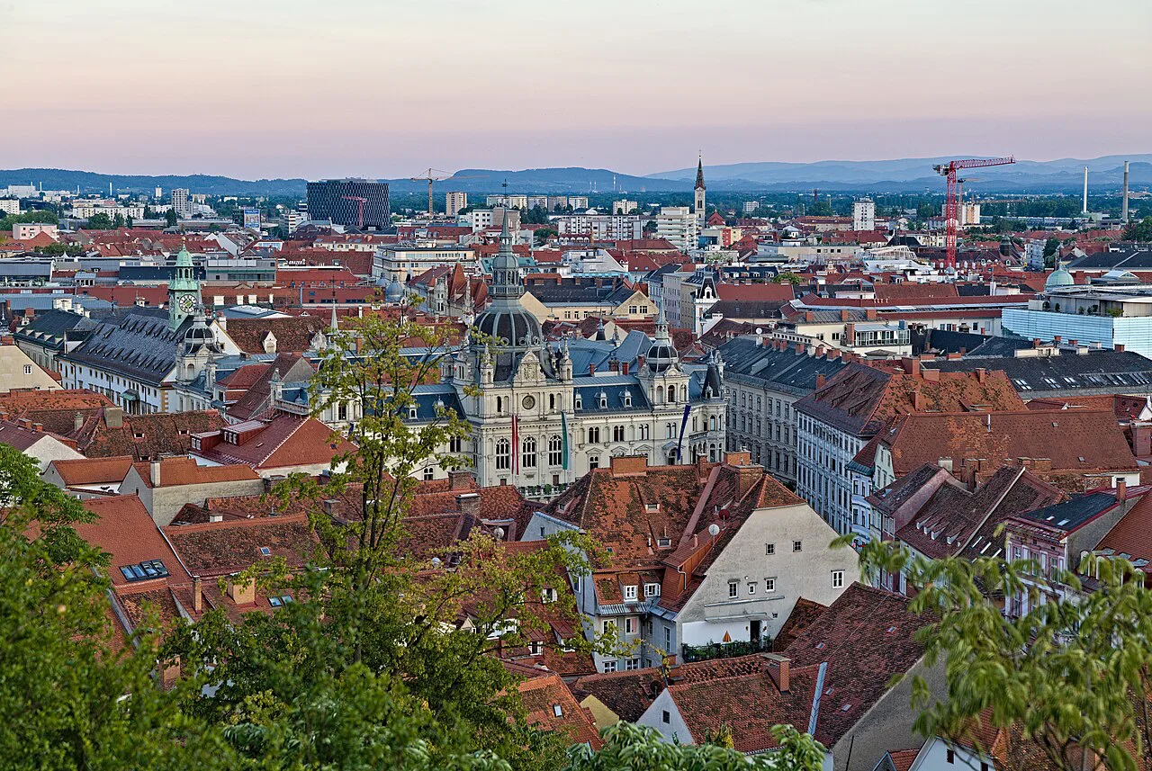Graz old-town roofs and the Rathaus seen from the Schlossberg.