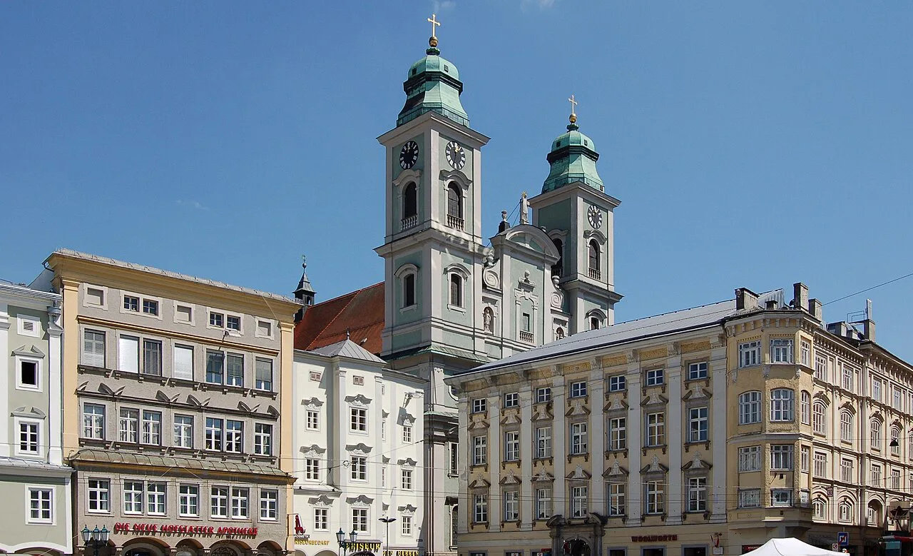 The twin towers of the Alter Dom seen from the Hauptplatz in Linz.