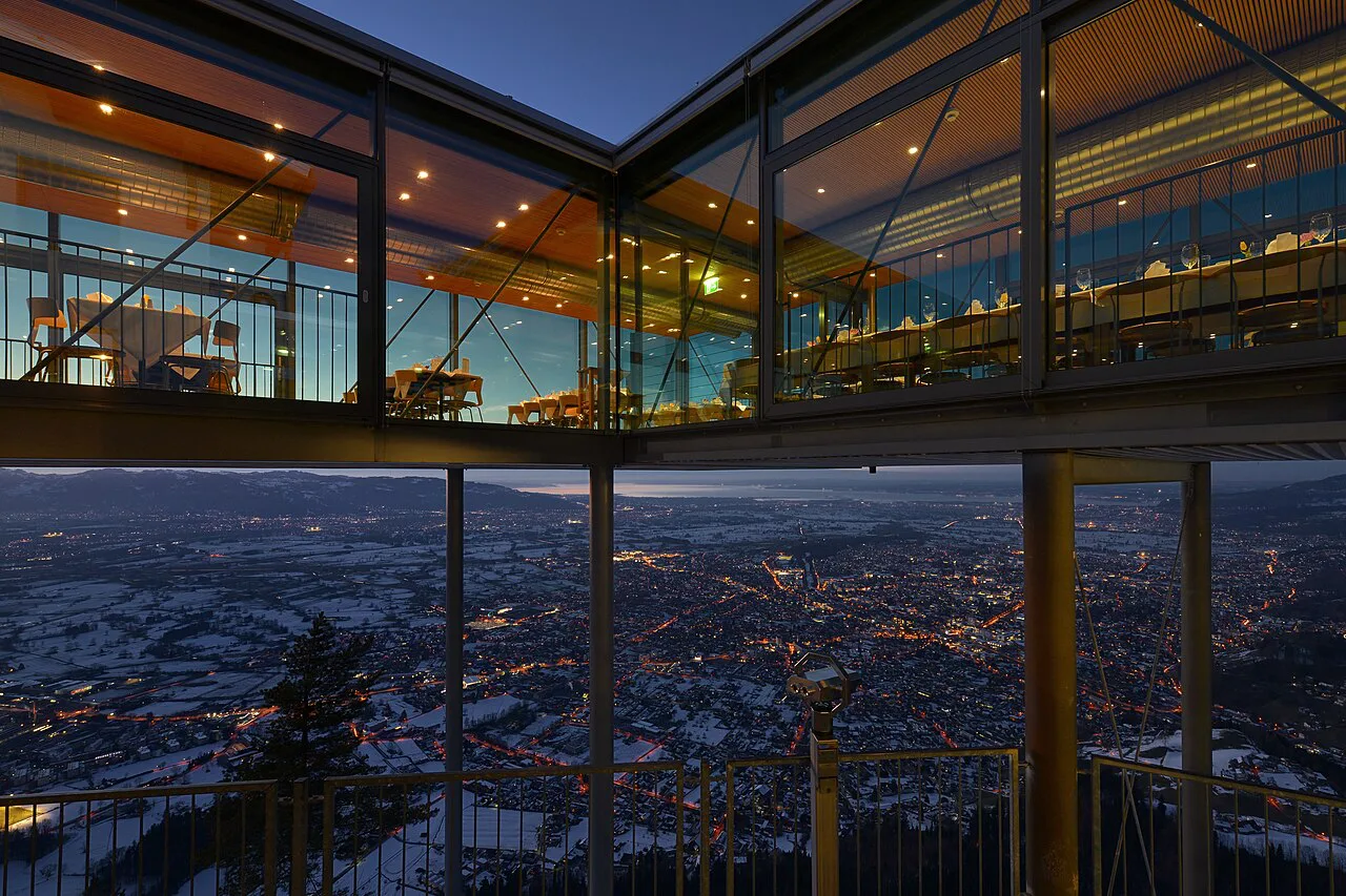 The Karren cable car's summit restaurant overlooking Dornbirn at night.