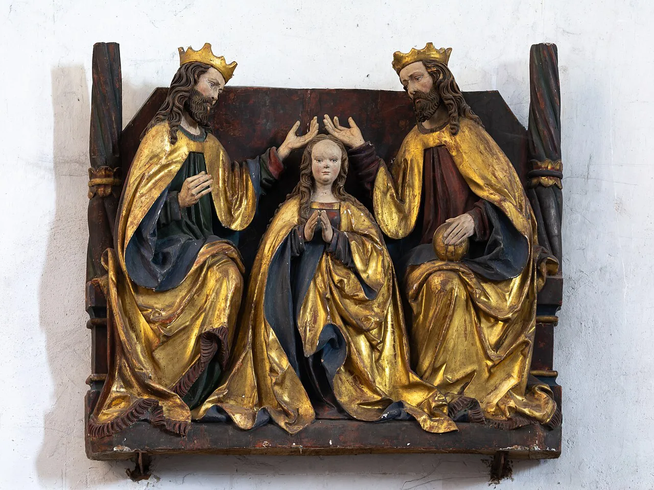 A gilded Coronation of the Virgin carving in St Stephen's parish church, Eggenburg.