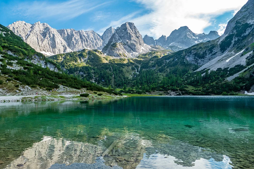 Mountains reflected in the Seebensee above Ehrwald in the Zugspitz Arena.