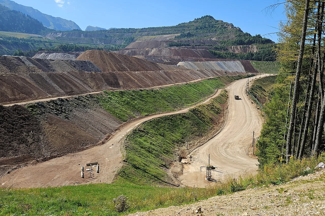 Haul roads winding across spoil heaps at the Erzberg mine.
