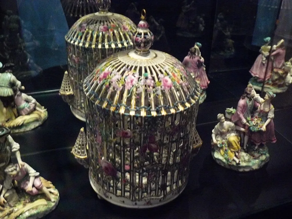 Porcelain birdcages and figurines on display in Schloss Esterházy, Eisenstadt.