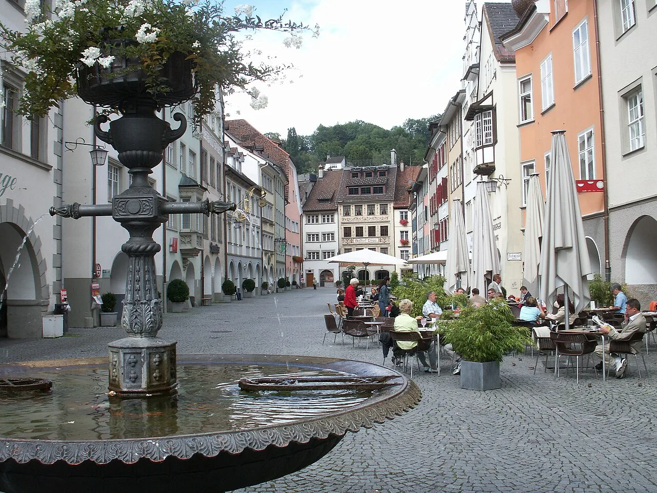 Café tables and a fountain on the Marktplatz in Feldkirch.