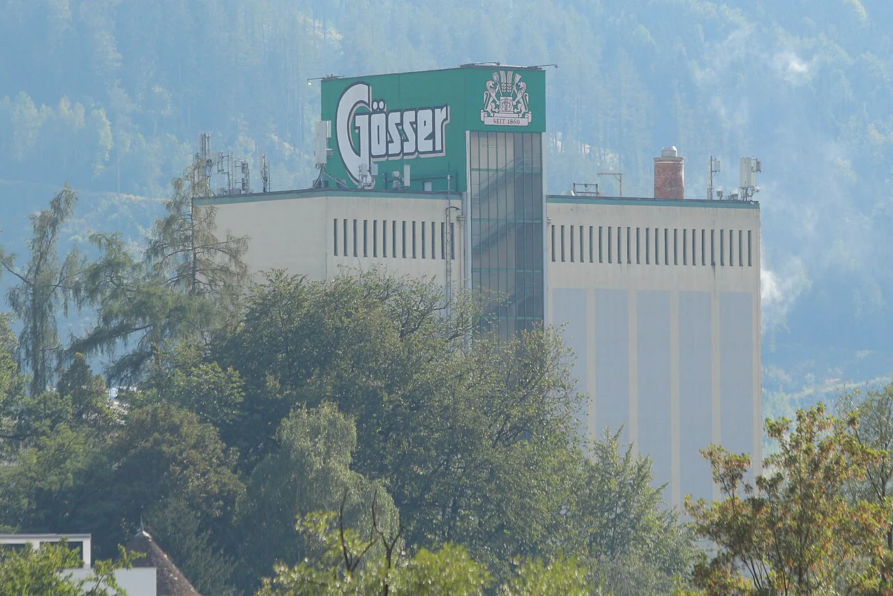 Part of the Göss brewery in Leoben, with the Gösser sign on the tower.