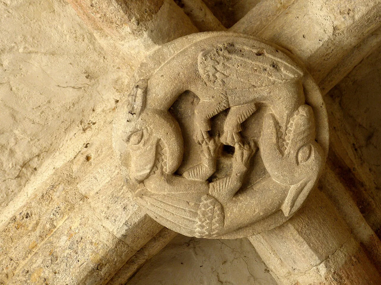 A carved boss with dragons in the Gozzoburg loggia in Krems.