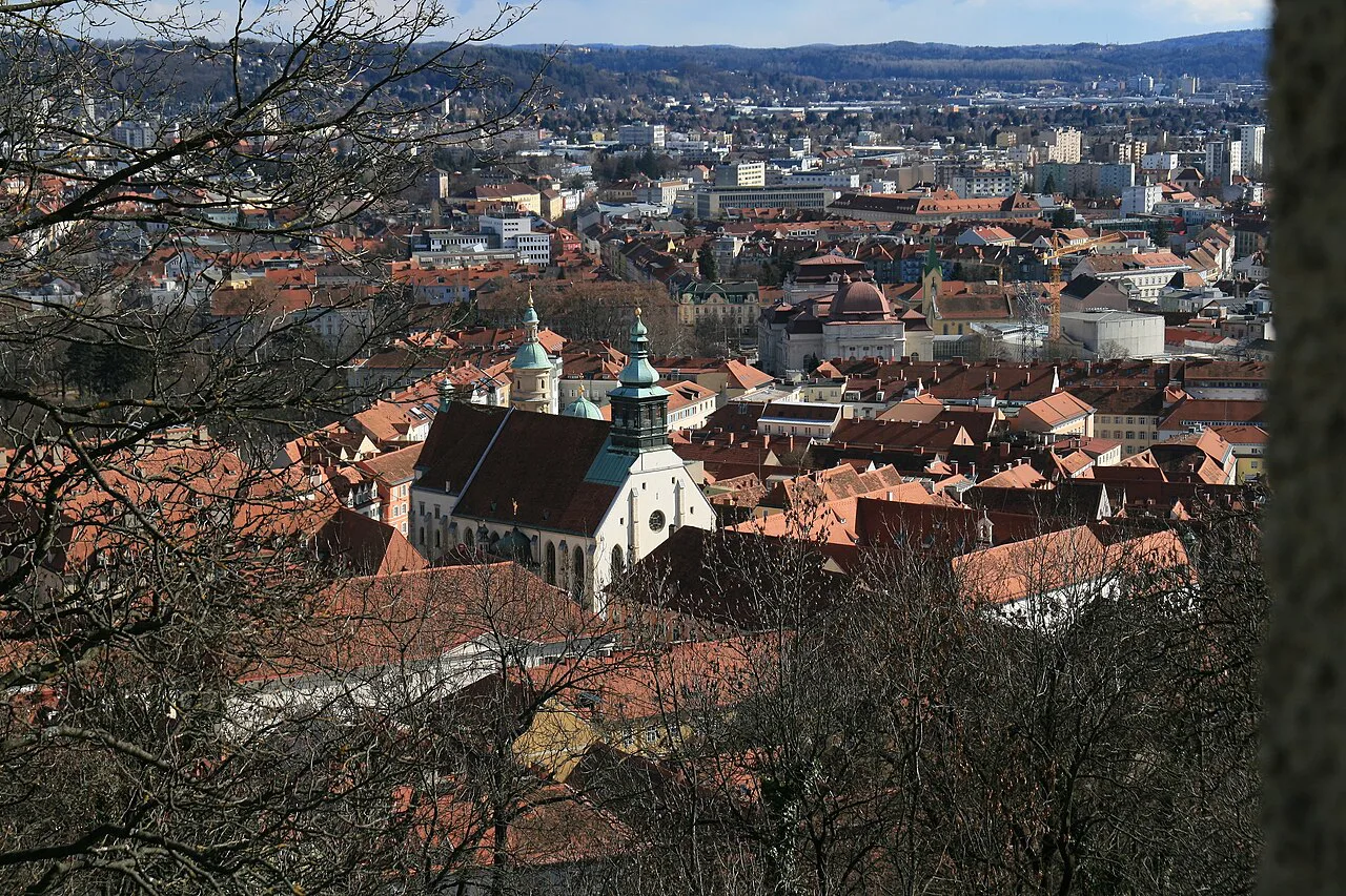 Graz Cathedral, the Katharinenkirche and the opera house seen from the Schlossberg.