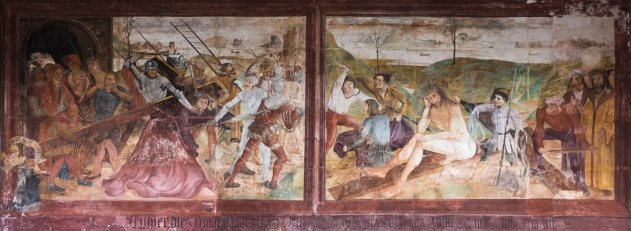 The Passion fresco above the main portal of Hallstatt's Catholic parish church.