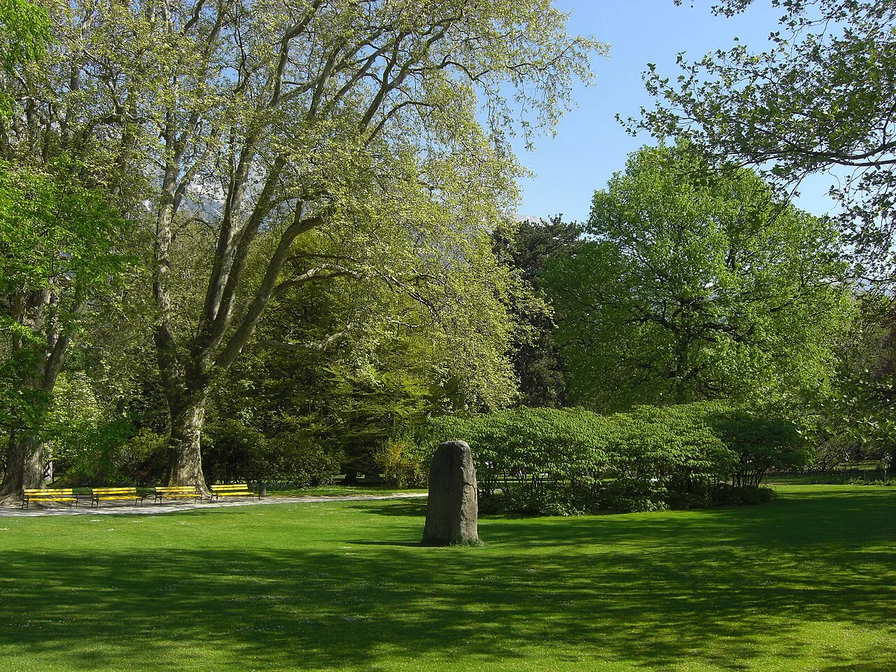 Lawns and mature trees in the Hofgarten park in Innsbruck.