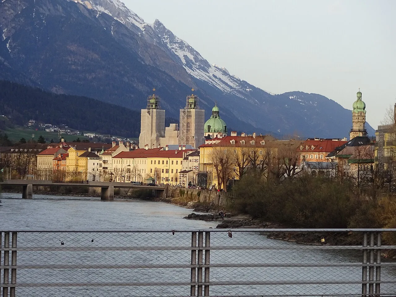 Innsbruck's old town and the mountains seen across the River Inn from the University Bridge.