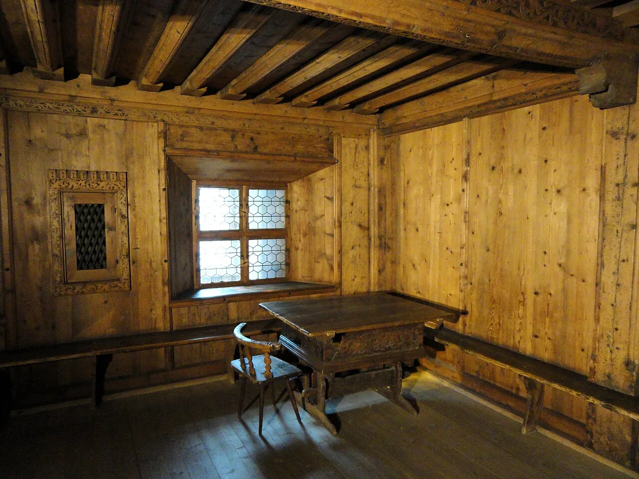 A panelled farmhouse room displayed in the Tyrolean Folk Art Museum, Innsbruck.