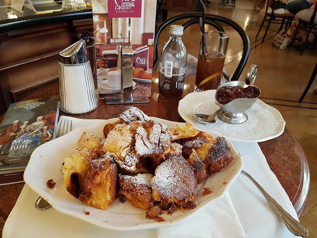 Kaiserschmarrn dusted with icing sugar at Café Central in Vienna.