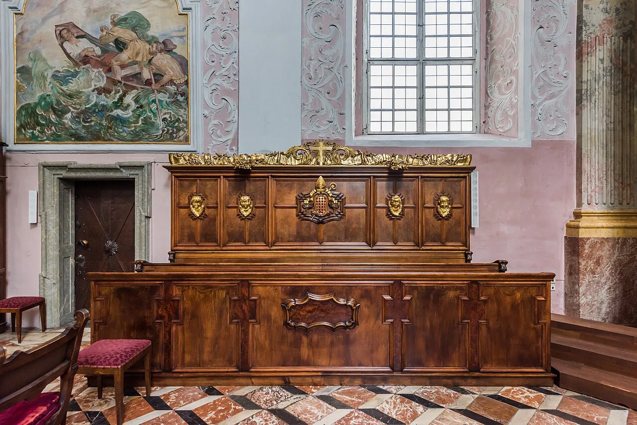 Carved wooden choir stalls in Klagenfurt Cathedral.