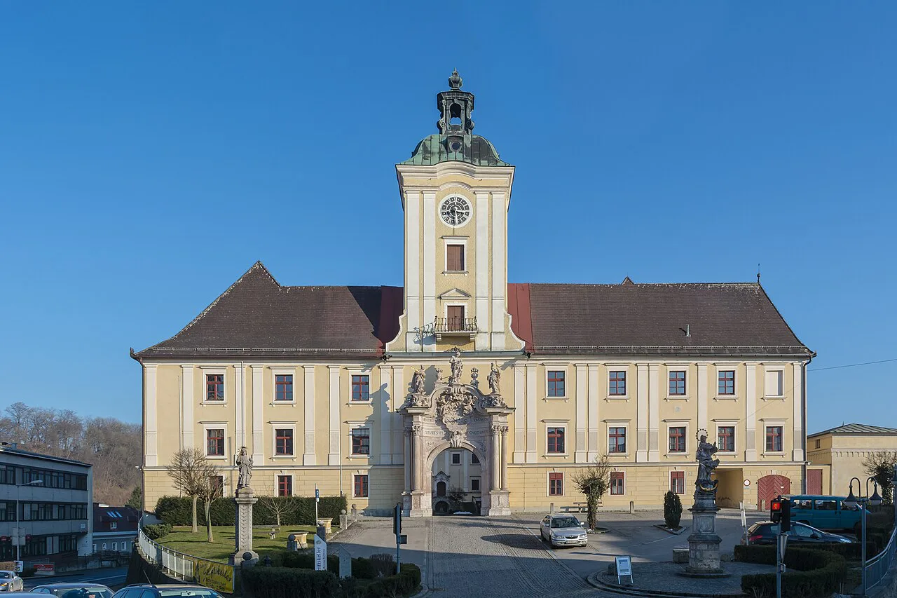 The west façade and main entrance of Lambach Abbey.