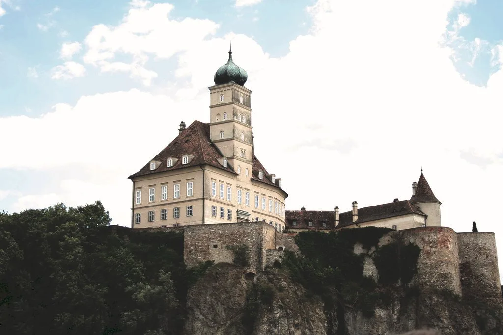 A castle on a rocky bluff above the Danube in the Wachau, near Melk.