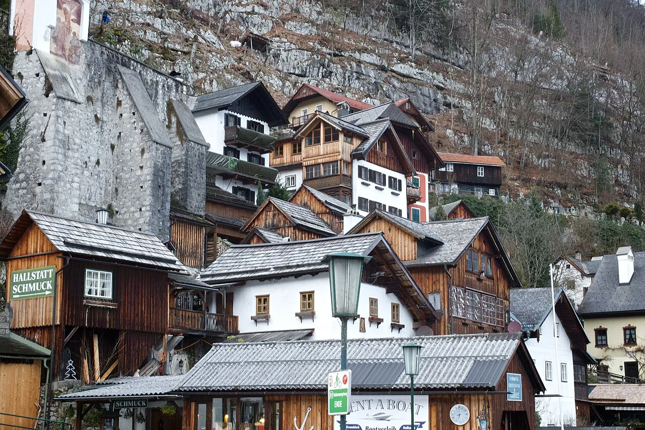 Wooden houses stacked up the hillside in the village of Hallstatt.