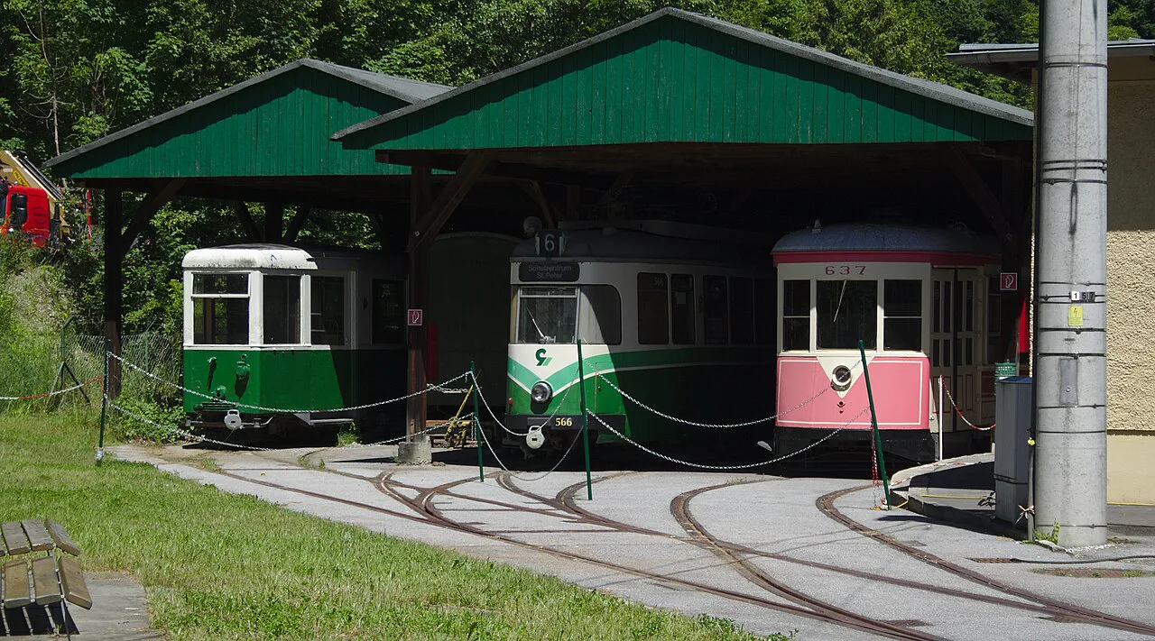 Historic trams in the depot of the Tramway Museum Graz.