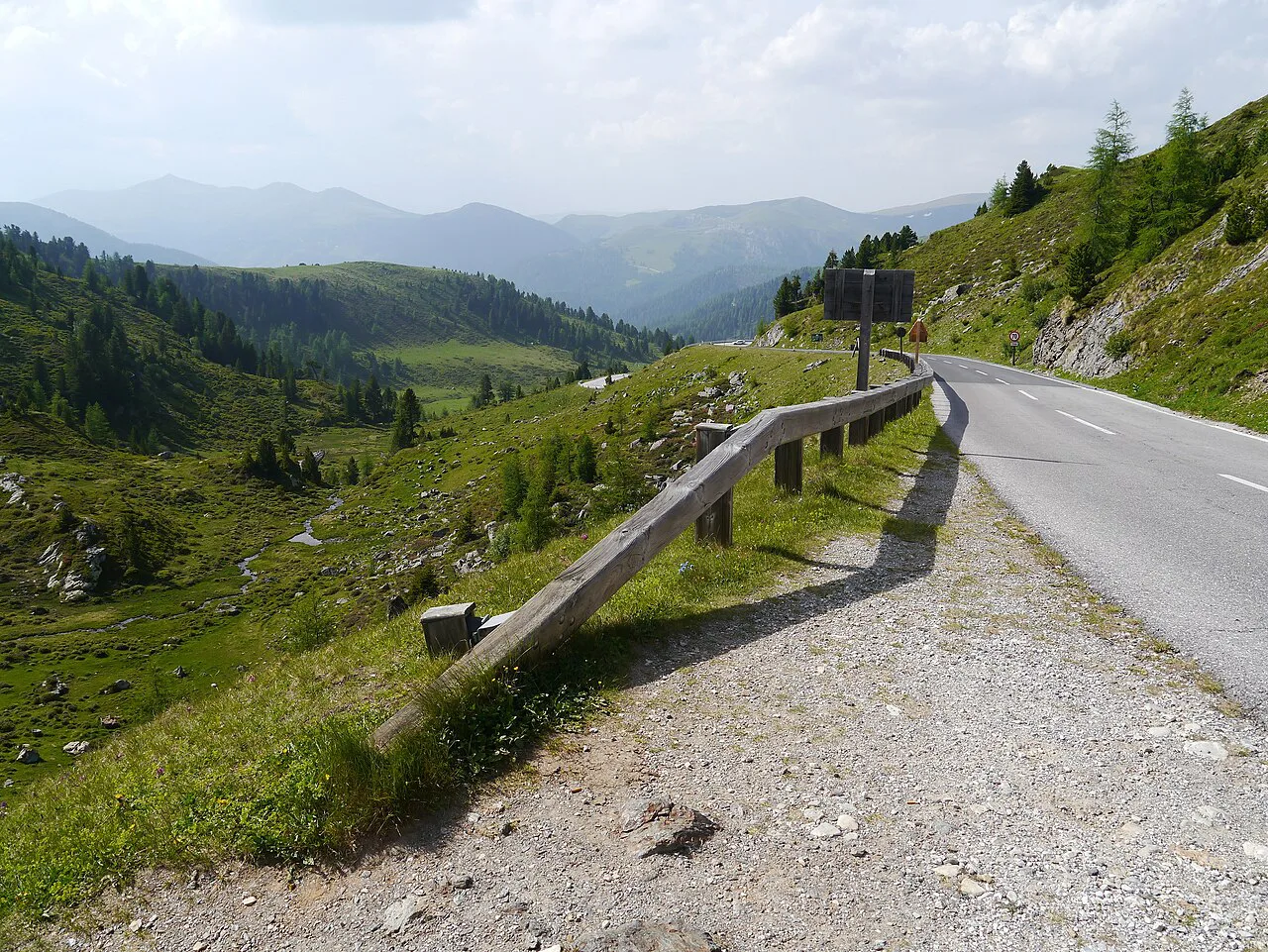 The Nockalmstraße curving along a green mountainside in Carinthia.