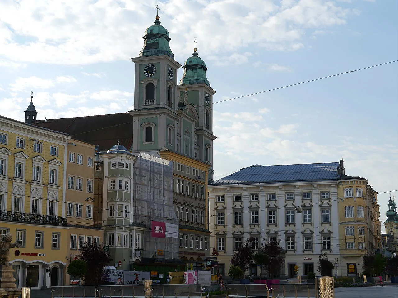 Baroque facades and church towers on the Hauptplatz, the main square of Linz.