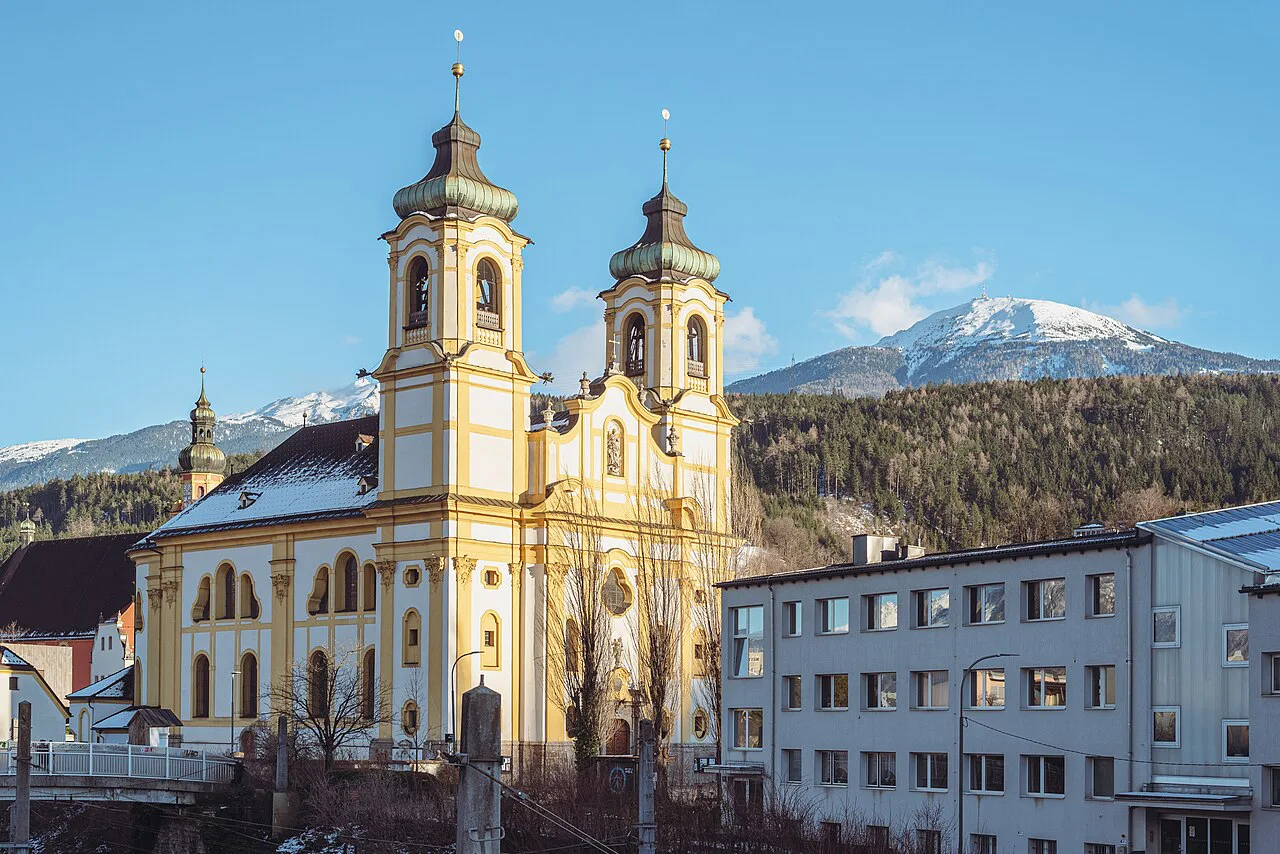 Wilten Basilica in Innsbruck with the Patscherkofel and its transmitter behind.