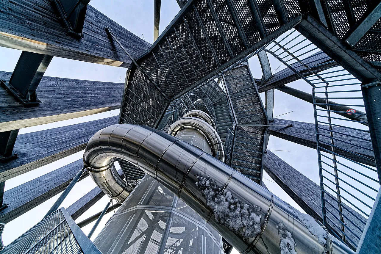 Looking up through the steel spiral structure of the Pyramidenkogel tower.