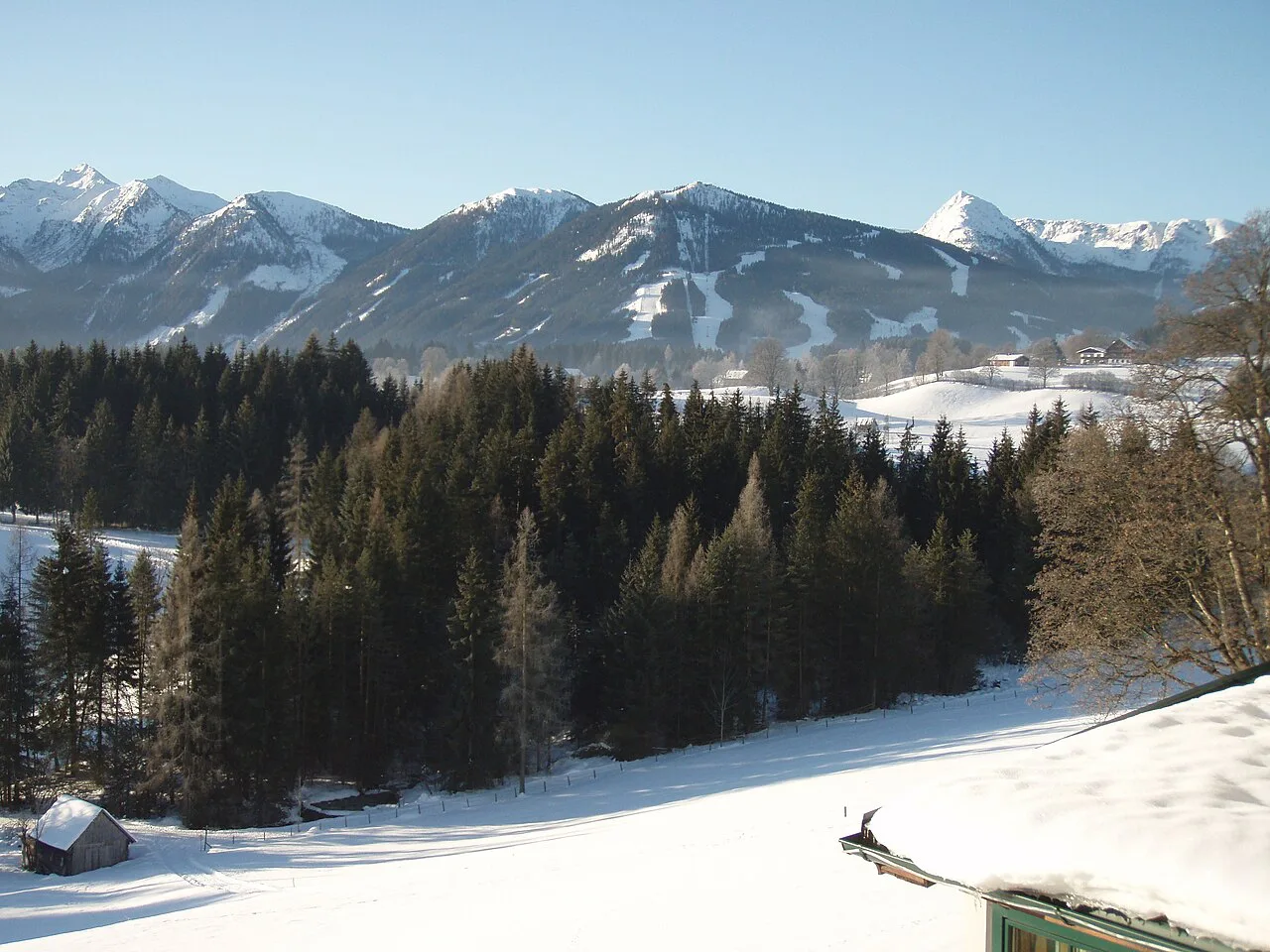 Winter view from Ramsau am Dachstein towards the Planai and the Schladming Tauern.