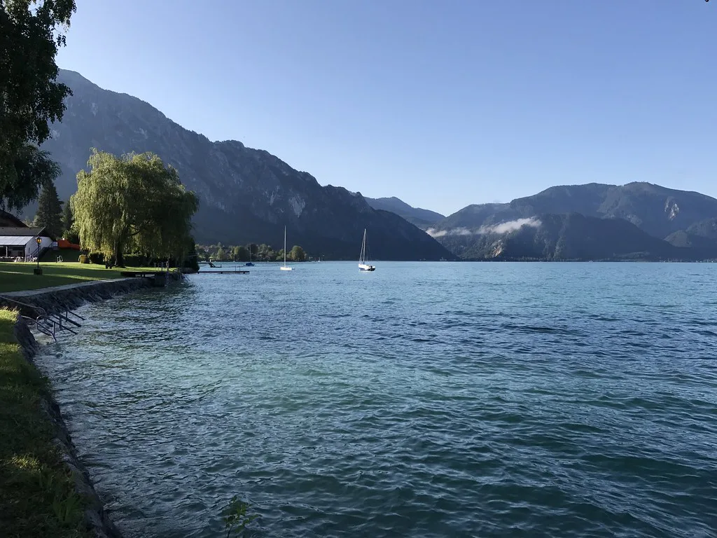 The Attersee in the Salzkammergut on a clear day, with mountains beyond.