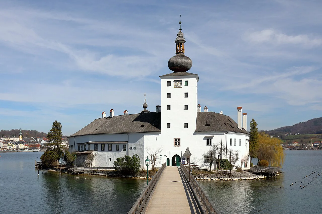 Schloss Ort on its island in the Traunsee, reached by a wooden bridge.