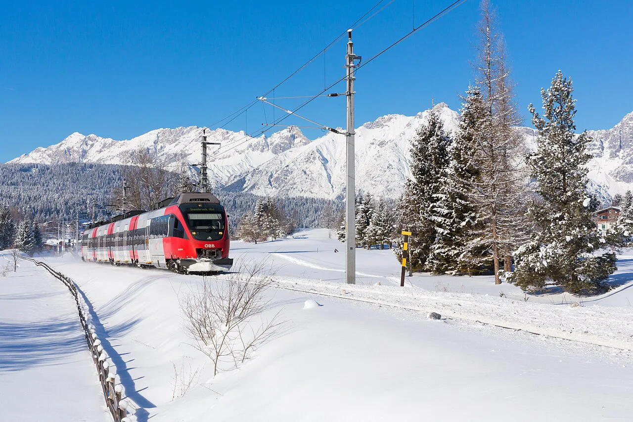 A regional train on the Mittenwald Railway near Seefeld in winter.