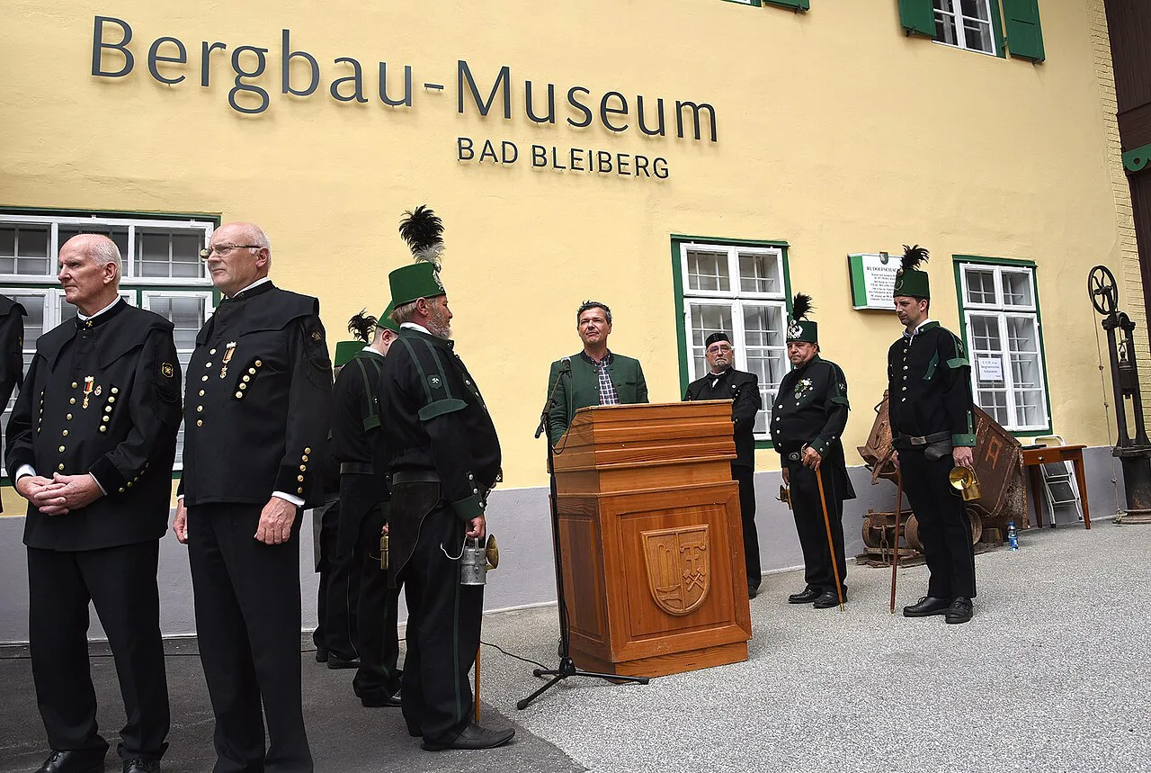 People in traditional miners' dress outside the Mining Museum in Bad Bleiberg.