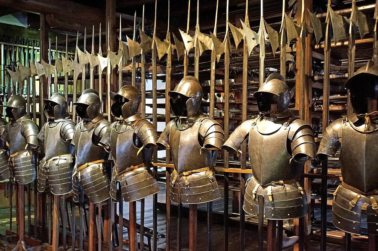 Rows of historic armour inside the Styrian Armoury (Landeszeughaus) in Graz.