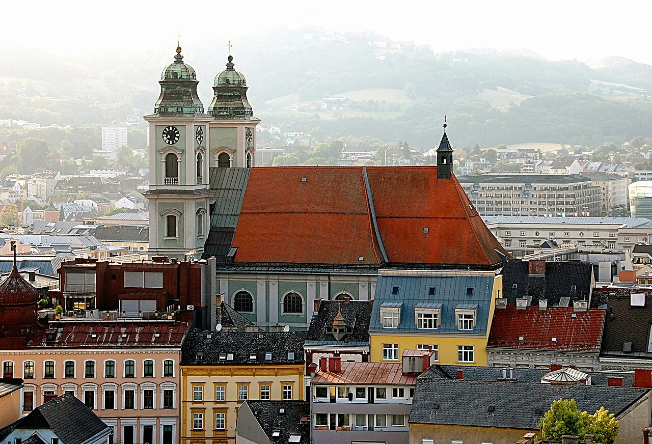 The twin towers of Linz's Old Cathedral (Alter Dom) above the city rooftops.