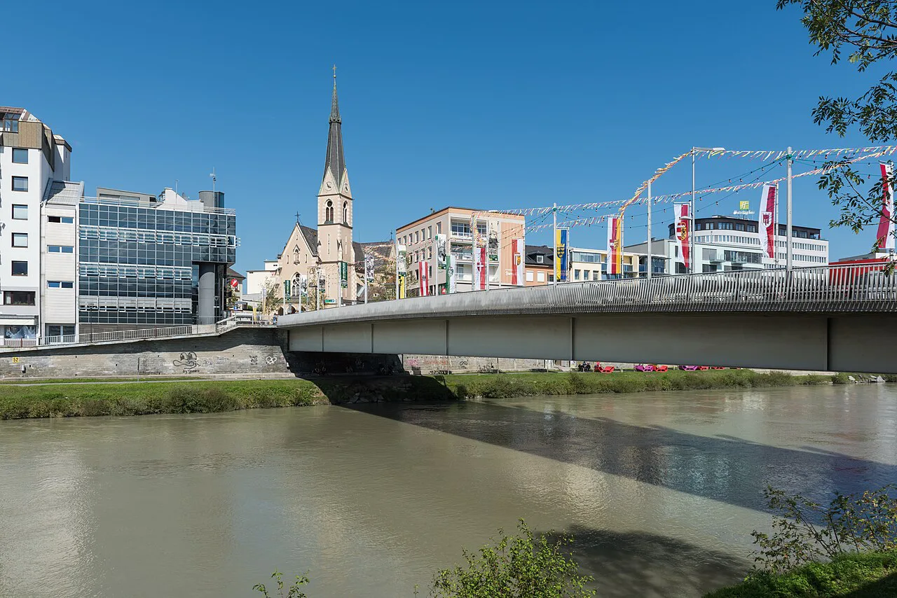 The city bridge over the Drava in Villach with the spire of St. Nikolai.