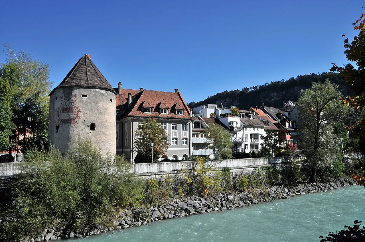Feldkirch's Wasserturm and Montfortgasse houses seen across the River Ill.