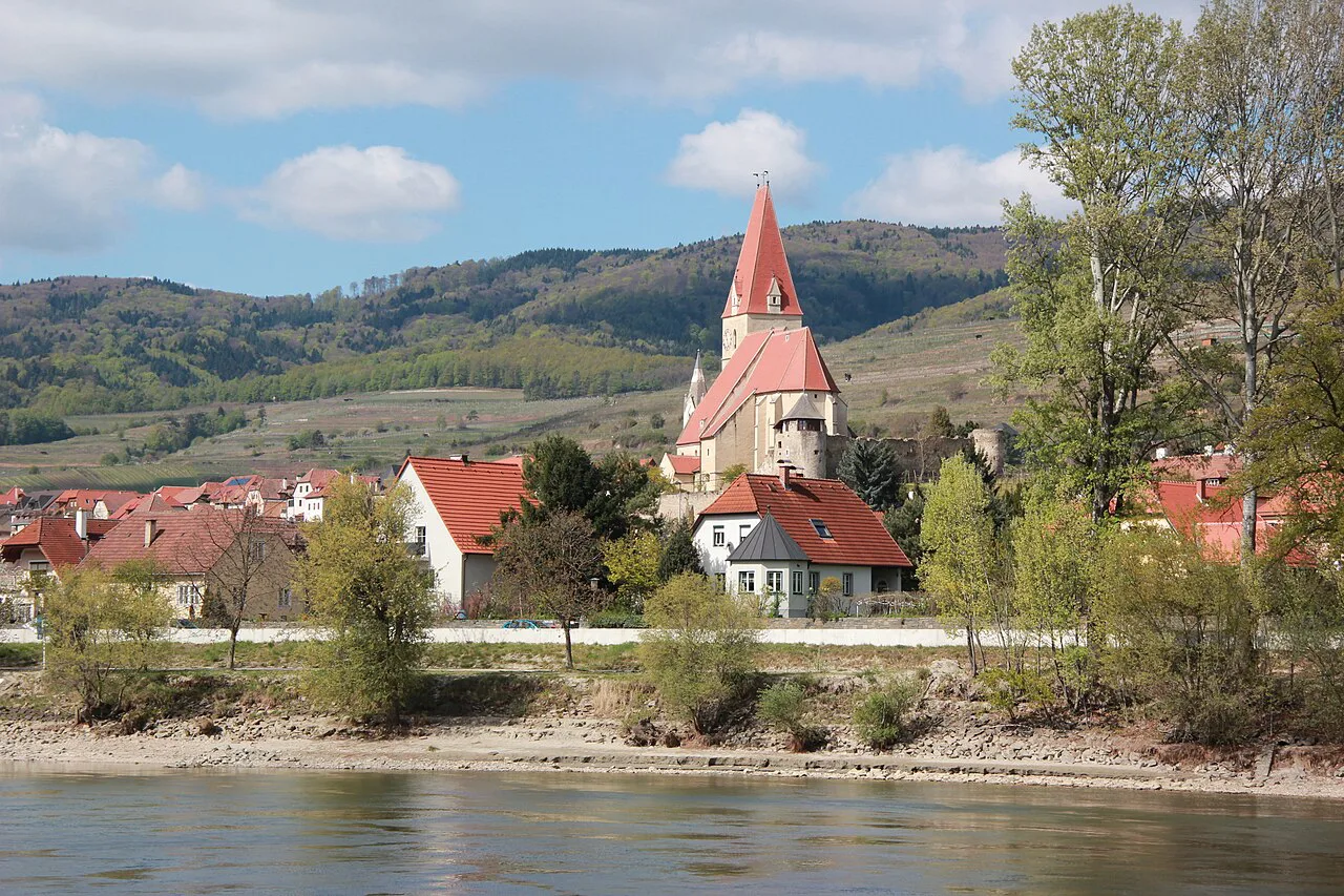 Weißenkirchen's church tower and houses seen from the Danube.